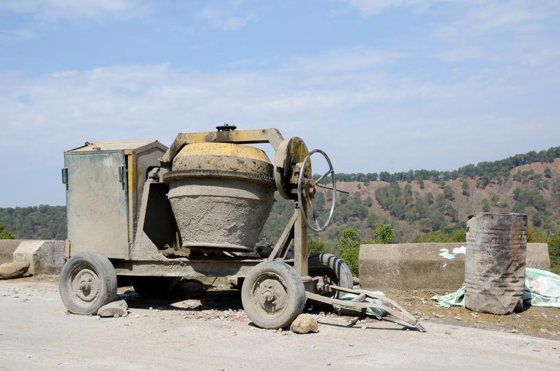 Commercial concrete being poured for a large building foundation