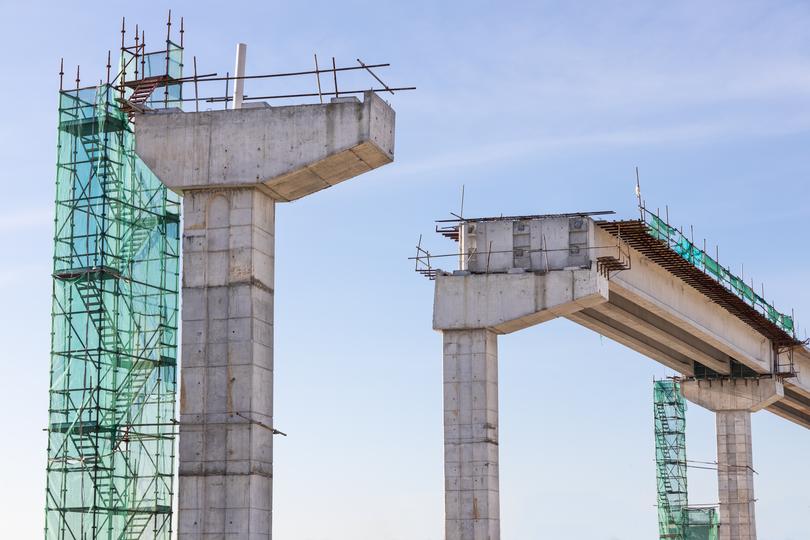 A modern concrete bridge under construction