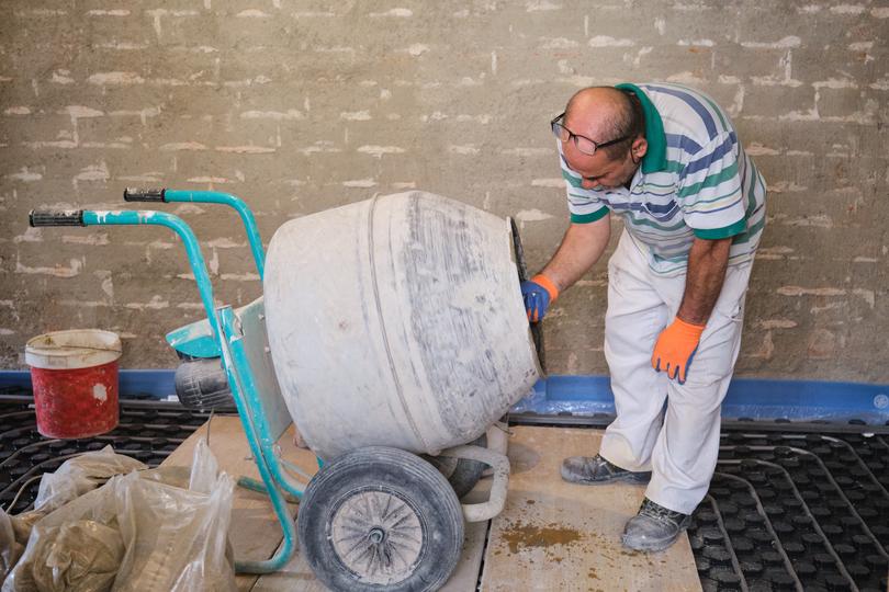 A concrete mixer on a construction site