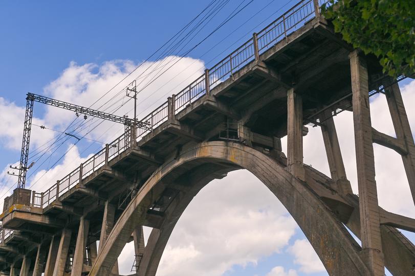 A modern concrete bridge under construction